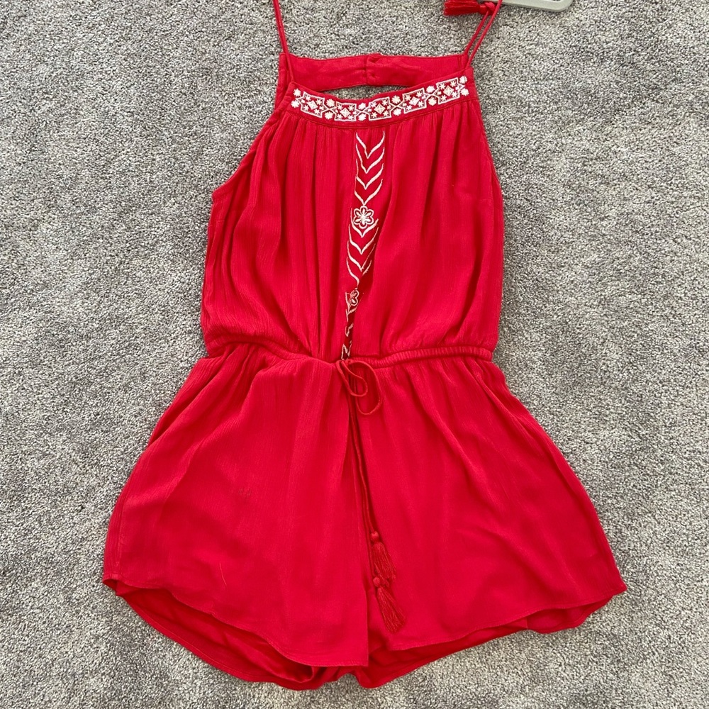 Francesca’s red romper